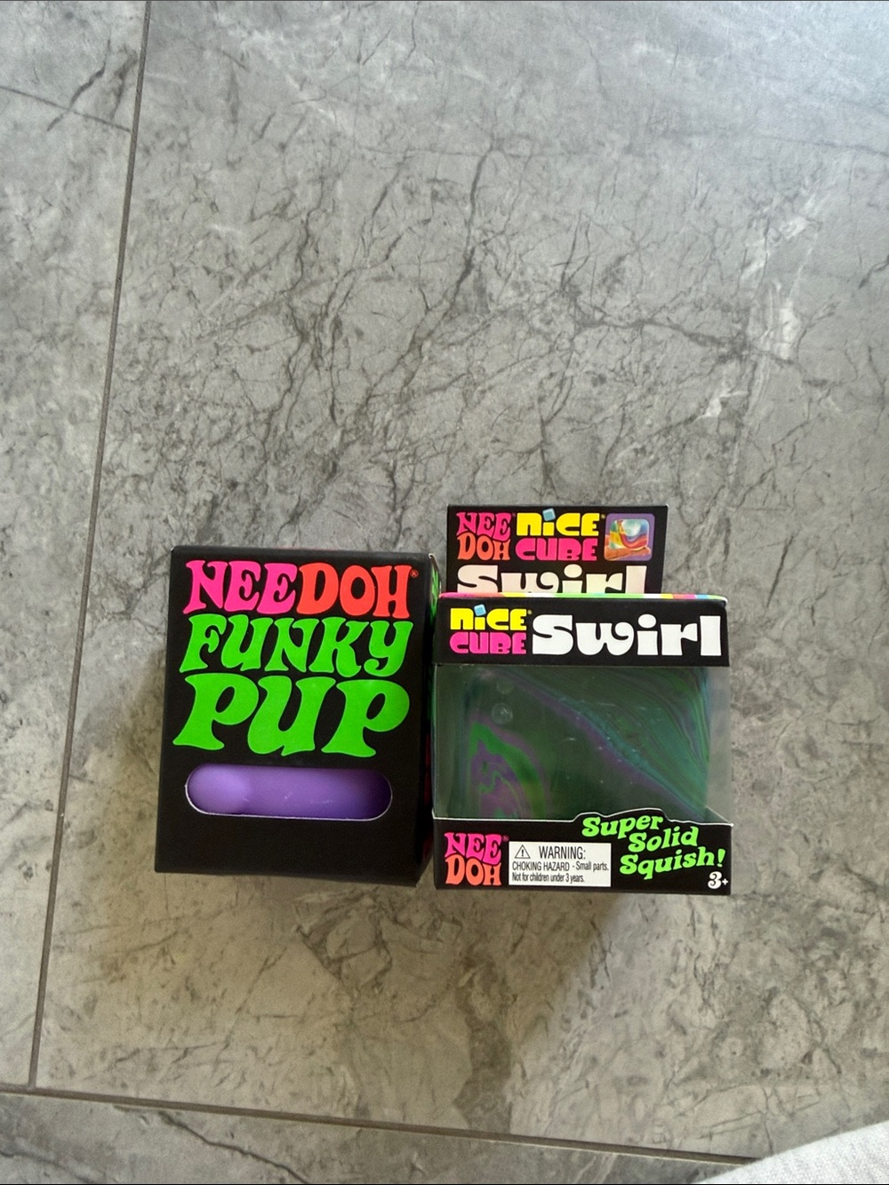 NEEDOH purple Funky Pup & Nice Cube Swirl Squishies - Purple & Green Swirl